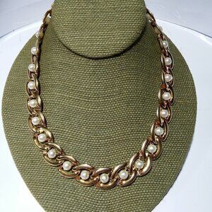 Women`s gold tone faux pearl chain necklace.